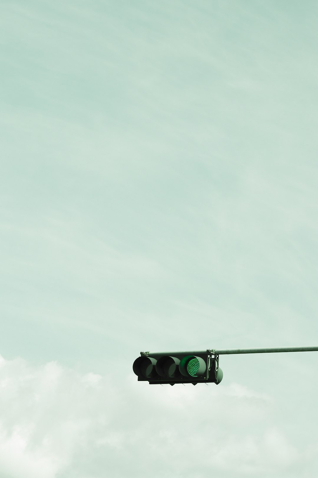 green-and-black-traffic-light-under-white-sky-during-daytime-t1n-a-tobew