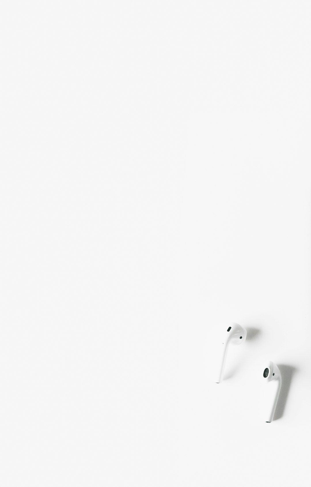 Flatlay photo of an airpod